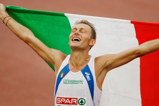 GOTHENBURG, SWEDEN - AUGUST 13:  Stefano Baldini of Italy celebrates winning gold during the Men's Marathon on day seven of the 19th European Athletics Championships at the Ullevi Stadium on August 13, 2006 in Gothenburg, Sweden.  (Photo by Ian Walton/Getty Images)