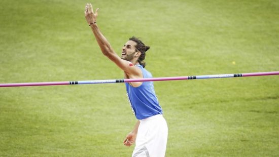 epa05418909 Gianmarco Tamberi of Italy reacts during the High Jump Men Final of the European Athletics Championships at the Olympic Stadium in Amsterdam, Netherlands, 10 July 2016.  EPA/KOEN VAN WEEL