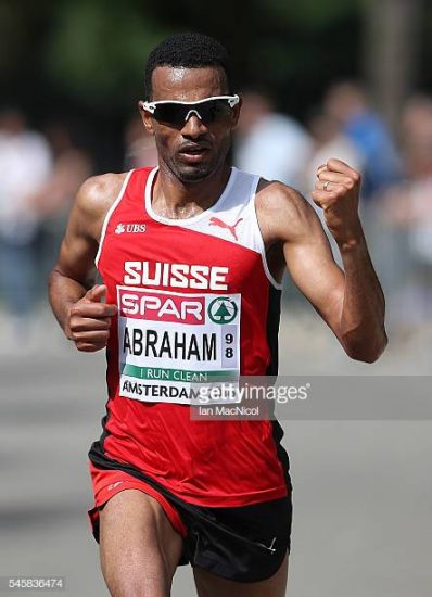 AMSTERDAM, NETHERLANDS - JULY 10: Tadesse Abraham of Switzerland celebrates winning the final of the mens half marathon on day five of The 23rd European Athletics Championships at Olympic Stadium on July 10, 2016 in Amsterdam, Netherlands.  (Photo by Ian MacNicol/Getty Images)