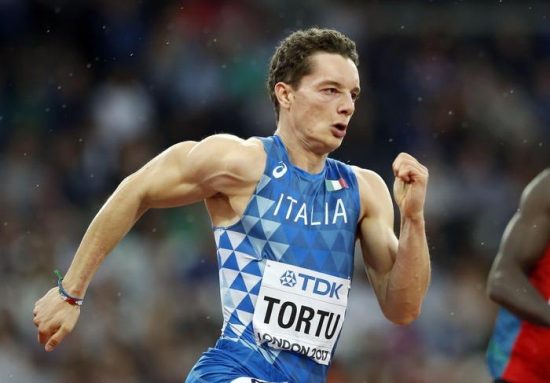 Italy's Filippo Tortu competes in a men's 200-meter first round heat during the World Athletics Championships in London Monday, Aug. 7, 2017. (ANSA/AP Photo/Alastair Grant) [CopyrightNotice: Copyright 2017 The Associated Press. All rights reserved.]