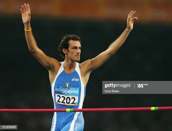 ATHENS - AUGUST 22: Alessandro Talotti of Italy reacts after his jump in the men's high jump final on August 22, 2004 during the Athens 2004 Summer Olympic Games at the Olympic Stadium in the Sports Complex in Athens, Greece. (Photo by Ezra Shaw/Getty Images)