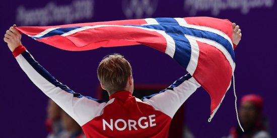TOPSHOT - Norway's Haavard Lorentzen celebrates winning the gold medal in the men's 500m speed skating event during the Pyeongchang 2018 Winter Olympic Games at the Gangneung Oval in Gangneung on February 19, 2018. / AFP PHOTO / Roberto SCHMIDT        (Photo credit should read ROBERTO SCHMIDT/AFP/Getty Images)