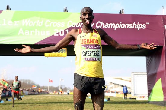 joshua-cheptegei-of-uganda-celebrates-winning-the-mens-news-photo-1575387648
