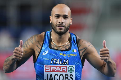 epa09055866 Lamont Marcell Jacobs of Italy reacts after the men's 60m heats at the 36th European Athletics Indoor Championships at the Arena Torun, in Torun, north-central Poland, 06 March 2021. EPA/Adam Warzawa POLAND OUT