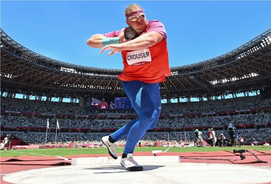 USA's Ryan Crouser competes in the men's shot put final during the Tokyo 2020 Olympic Games at the Olympic stadium in Tokyo on August 5, 2021. (Photo by Andrej ISAKOVIC / AFP) (Photo by ANDREJ ISAKOVIC/AFP via Getty Images)