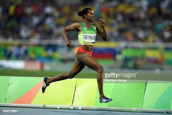 RIO DE JANEIRO, BRAZIL - AUGUST 14: Dawit Seyaum of Ethiopia competes in the Women's 1500 meter semifinals on Day 9 of the Rio 2016 Olympic Games at the Olympic Stadium on August 14, 2016 in Rio de Janeiro, Brazil. (Photo by Matthias Hangst/Getty Images)