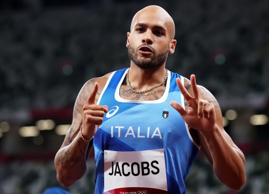 epa09382324 Lamont Marcell Jacobs of Italy gestures after his run in the Men's 100m heats during the Athletics events of the Tokyo 2020 Olympic Games at the Olympic Stadium in Tokyo, Japan, 31 July 2021. EPA/DIEGO AZUBEL